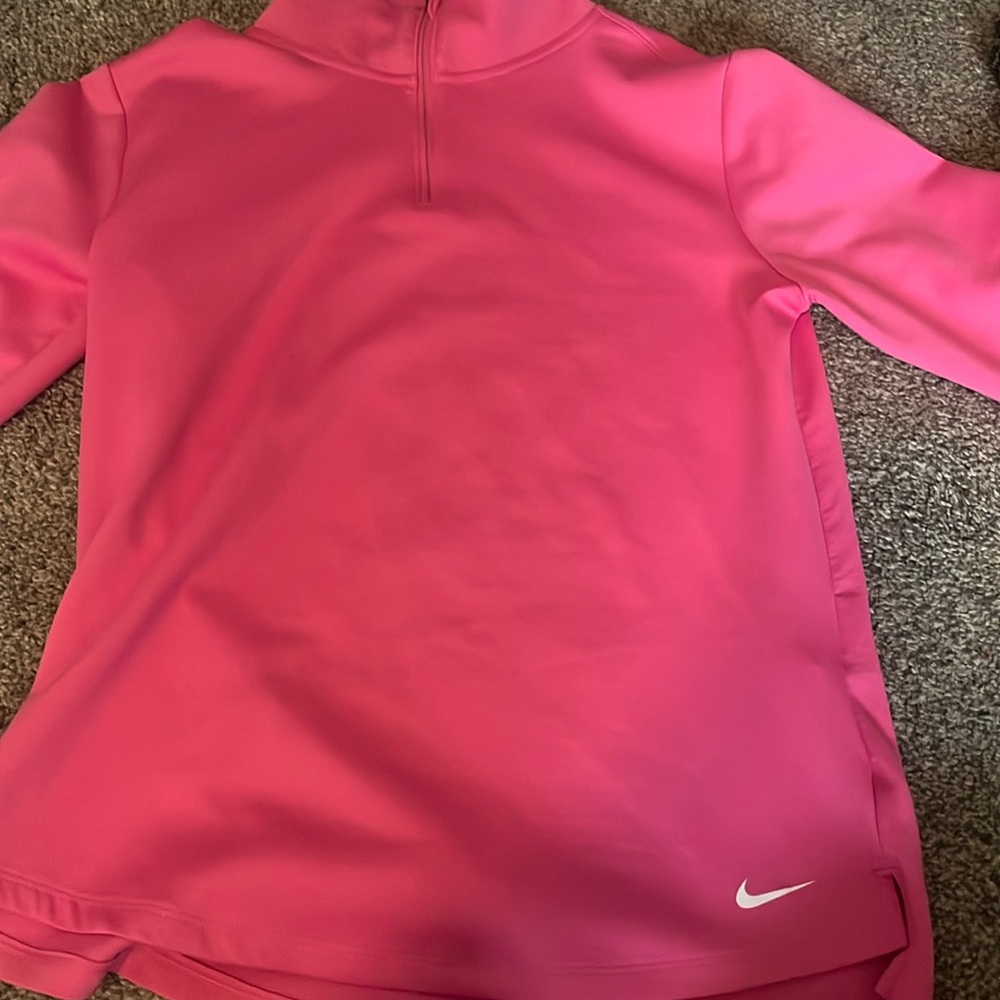 Woman’s pink Nike fleese lined quarter zip